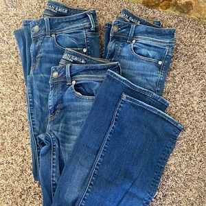2 pair American Eagle super stretch kick boot jeans womens